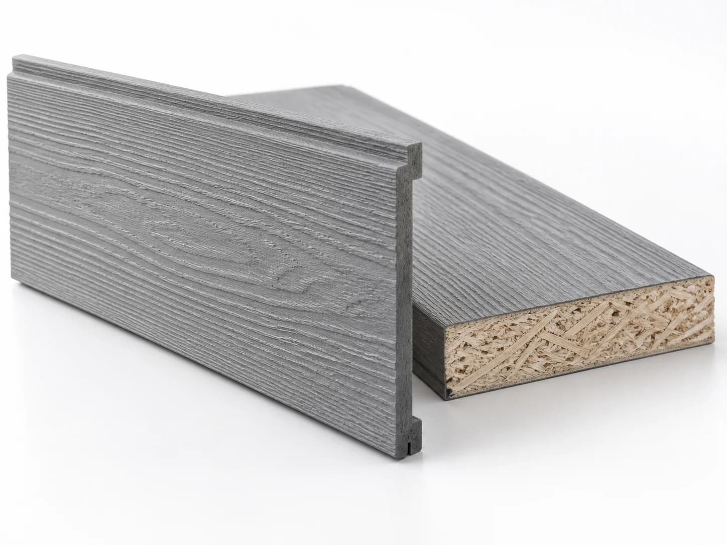 Engineered-wood siding samples showing a finished face and a bonded wood-fibre cut edge.