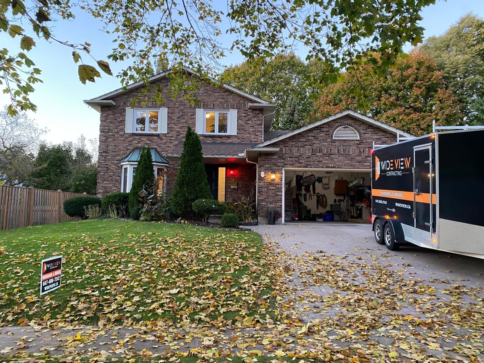 Wide View Contracting work trailer at a residential project.